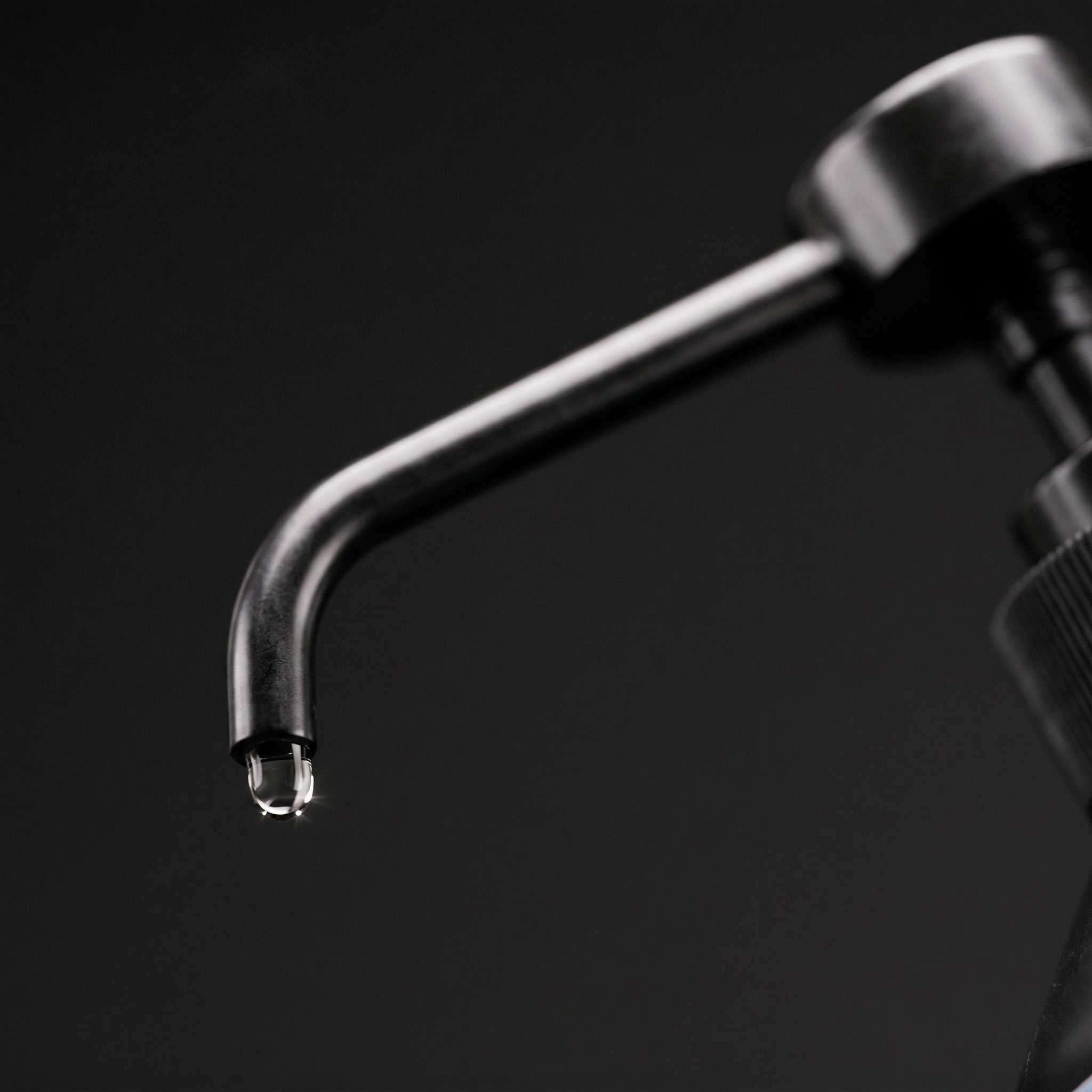 COBALT liquid pump dispensing a glycerol droplet - macro